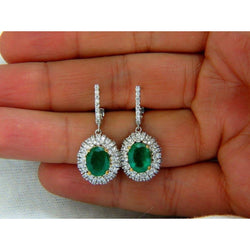 Smeraldo verde a forma ovale con orecchino pendente diamante 5,04 carati