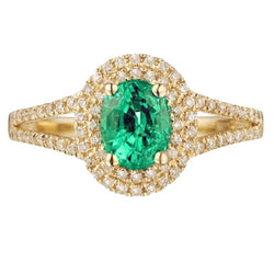 Smeraldo verde di forma ovale in oro 14K con anello di diamanti tondo 6 carati