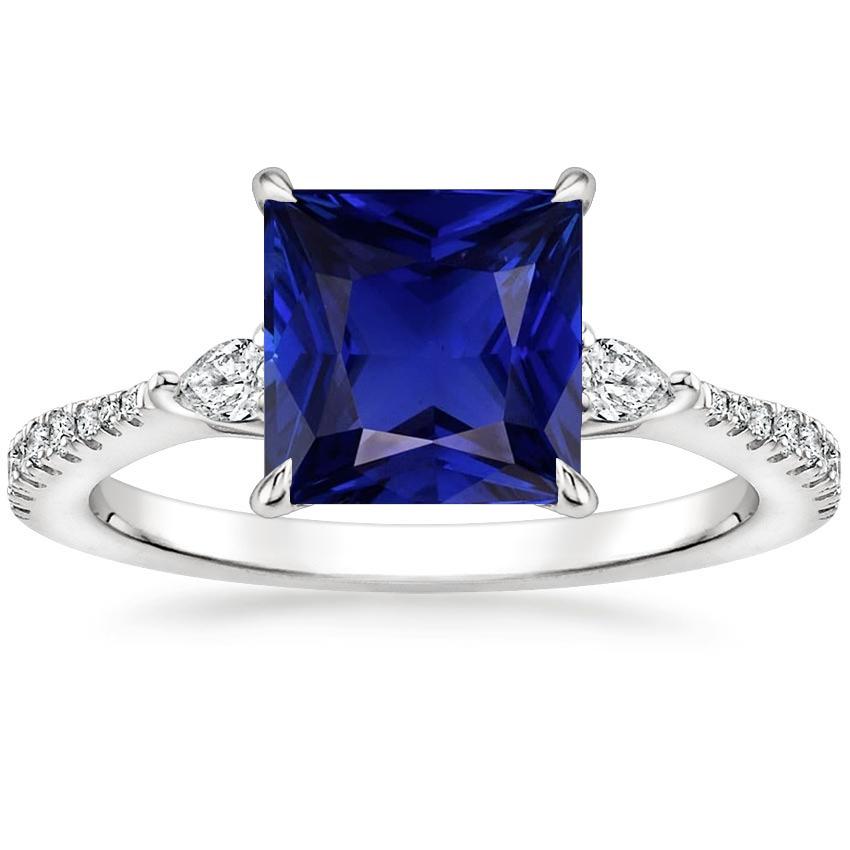 Solitario Princess Blue Sapphire Pear & Round Diamond Accenti 6 Carati - harrychadent.it