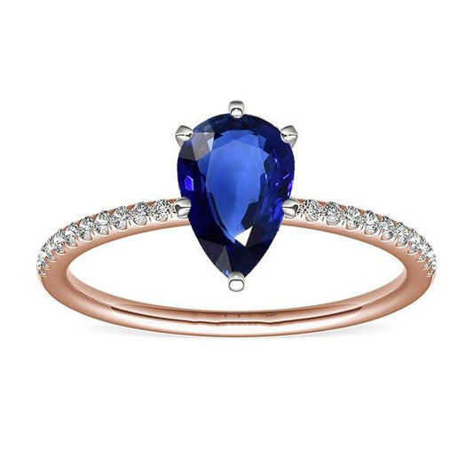 Solitario con pietra preziosa. anello con zaffiro blu e pavé di diamanti. 3.50 carati - harrychadent.it