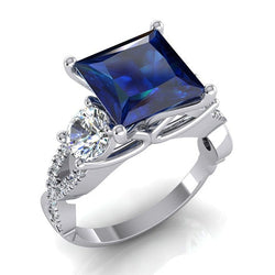 Anello trilogy con zaffiri blu e diamanti brillanti taglio baguette oro Anello trilogy con zaffiri blu e diamanti brillanti taglio baguette oro