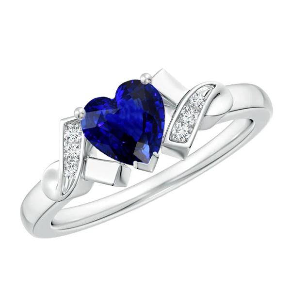 Anello in zaffiro di Ceylon a taglio cuore con pietre preziose in oro stile nastro 2 carati - harrychadent.it